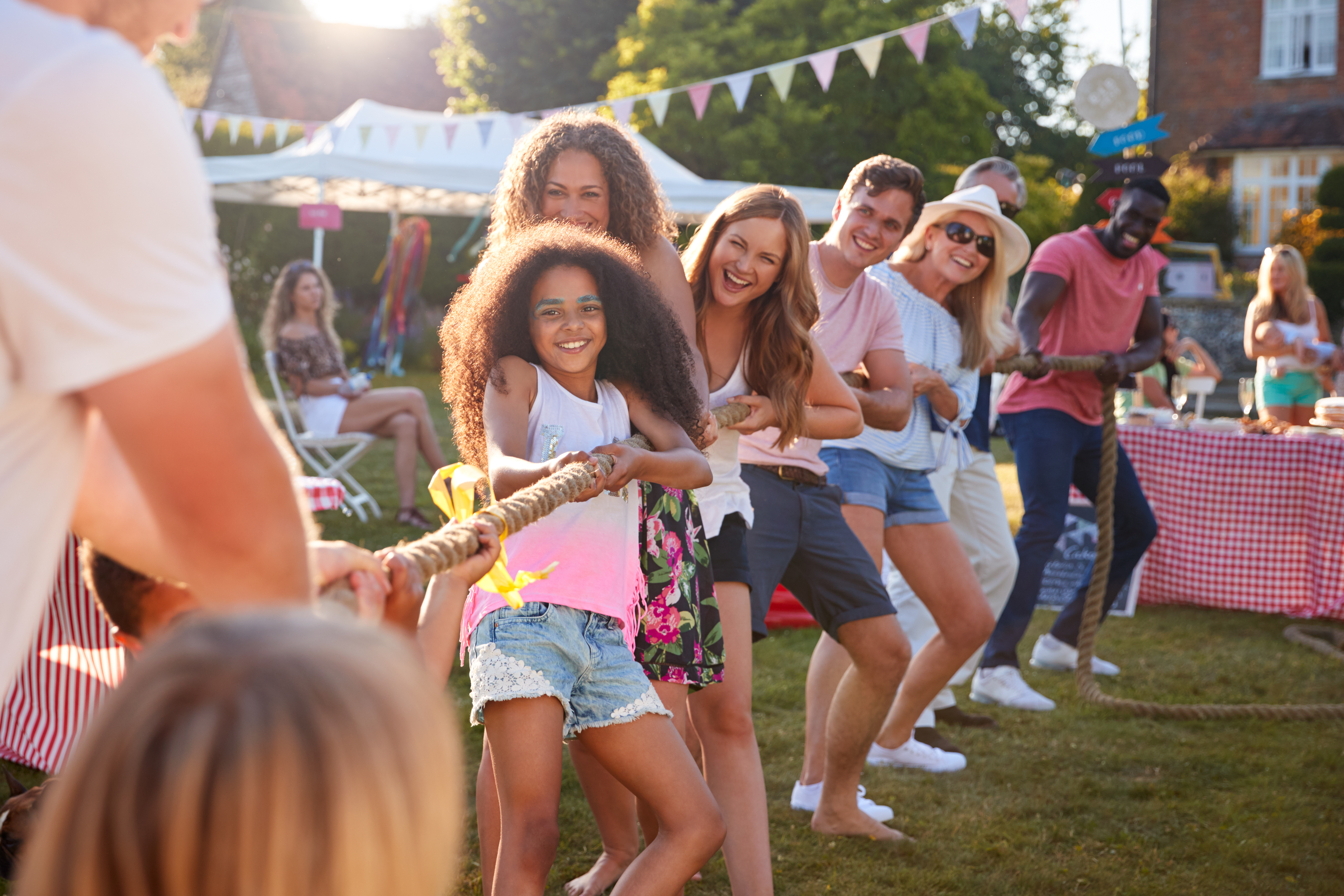 Tug of war game being played at a fete